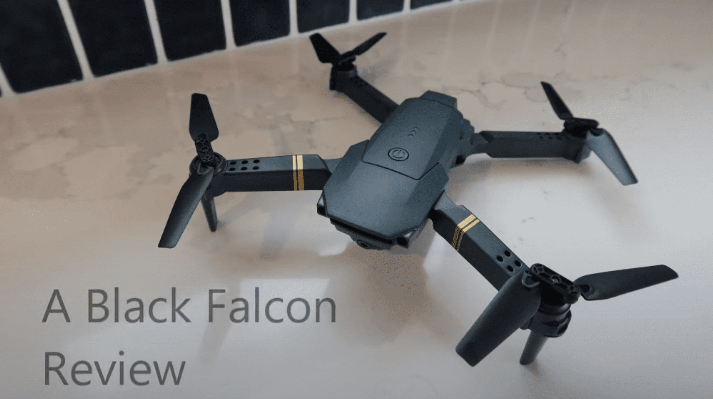 Black Falcon 4K Drone lying on the table
