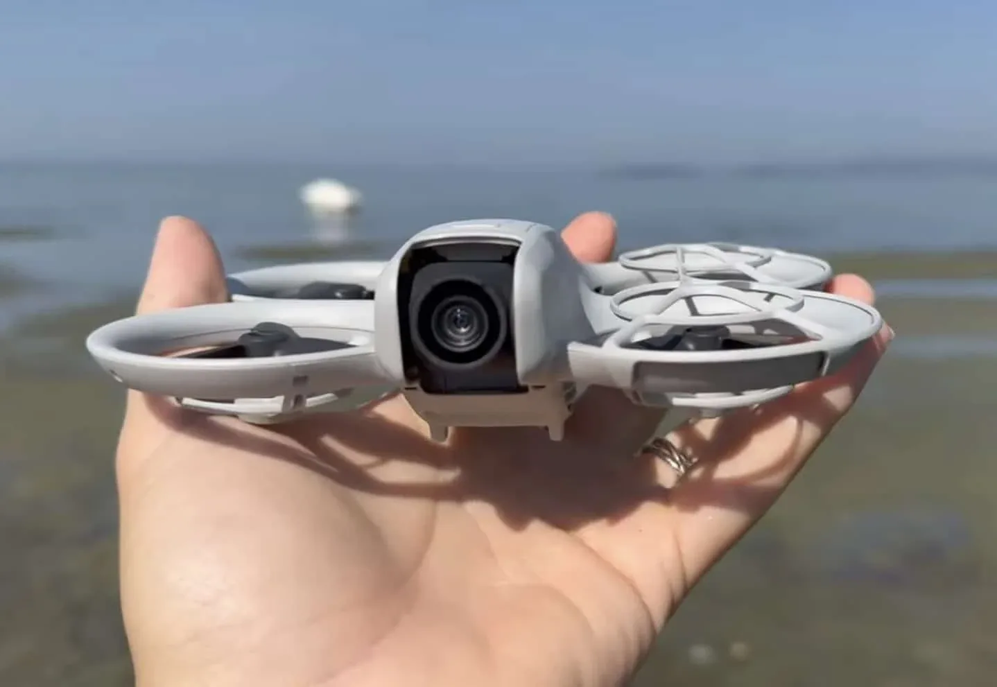 dji neo drone in a hand